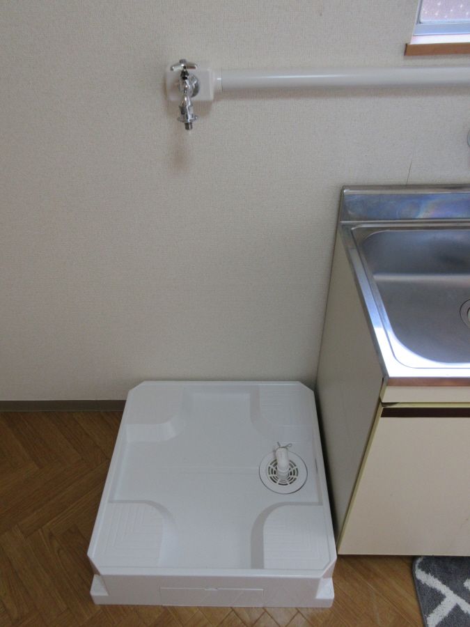 y̑ݔz@