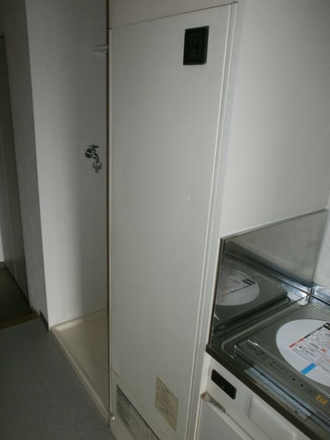 y̑ݔz@