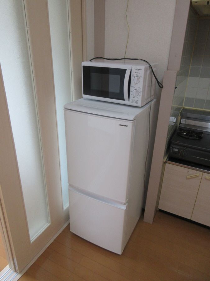 y̑ݔz@