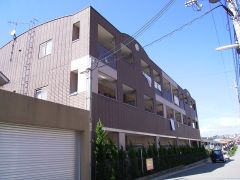 ���Ɍ��_�ˎs�k��J��쒬�̃}���V�����̌����O��